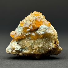 Load image into Gallery viewer, Hessonite Garnet Cluster on Matrix – Natural Collector Specimen from Pakistan | High-Grade Orange-Red Garnet Crystals
