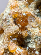 Load image into Gallery viewer, Hessonite Garnet Cluster on Matrix – Natural Collector Specimen from Pakistan | High-Grade Orange-Red Garnet Crystals
