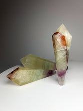 Load image into Gallery viewer, Dendrite Manganese and Iron Included Rainbow Fluorite Wand
