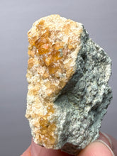 Load image into Gallery viewer, Hessonite Garnet Cluster on Matrix – Natural Collector Specimen from Pakistan | High-Grade Orange-Red Garnet Crystals
