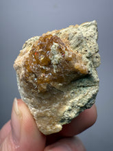 Load image into Gallery viewer, Hessonite Garnet Cluster on Matrix – Natural Collector Specimen from Pakistan | High-Grade Orange-Red Garnet Crystals
