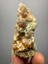 Load image into Gallery viewer, Hessonite Garnet Cluster on Matrix – Natural Collector Specimen from Pakistan | High-Grade Orange-Red Garnet Crystals
