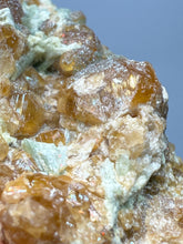 Load image into Gallery viewer, Hessonite Garnet Cluster on Matrix – Natural Collector Specimen from Pakistan | High-Grade Orange-Red Garnet Crystals
