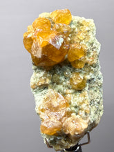 Load image into Gallery viewer, Hessonite Garnet Cluster on Matrix – Natural Collector Specimen from Pakistan | High-Grade Orange-Red Garnet Crystals
