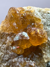 Load image into Gallery viewer, Hessonite Garnet Cluster on Matrix – Natural Collector Specimen from Pakistan | High-Grade Orange-Red Garnet Crystals
