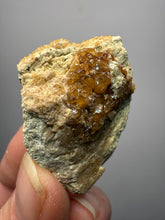 Load image into Gallery viewer, Hessonite Garnet Cluster on Matrix – Natural Collector Specimen from Pakistan | High-Grade Orange-Red Garnet Crystals
