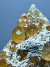 Load image into Gallery viewer, Hessonite Garnet Cluster on Matrix – Natural Collector Specimen from Pakistan | High-Grade Orange-Red Garnet Crystals
