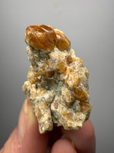 Load image into Gallery viewer, Hessonite Garnet Cluster on Matrix – Natural Collector Specimen from Pakistan | High-Grade Orange-Red Garnet Crystals
