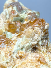 Load image into Gallery viewer, Hessonite Garnet Cluster on Matrix – Natural Collector Specimen from Pakistan | High-Grade Orange-Red Garnet Crystals
