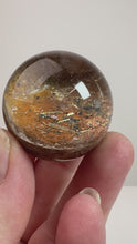 Load and play video in Gallery viewer, Garden Quartz Golden Rutile and/or Cubic Golden Pyrite Sphere • High Grade • RARE
