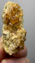 Load and play video in Gallery viewer, Hessonite Garnet Cluster on Matrix – Natural Collector Specimen from Pakistan | High-Grade Orange-Red Garnet Crystals
