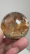 Load and play video in Gallery viewer, Garden Quartz Golden Rutile and/or Cubic Golden Pyrite Sphere • High Grade • RARE
