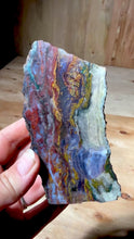 Load and play video in Gallery viewer, PREMIUM SELF STANDING DISPLAY or LAPIDARY SLAB • Moroccan “Dream Landscape Jagate” (Purple, Teal, Red, Green, Red, Yellow &amp; Orange Moss Plume Agate + Jasper) Stone End Cap • High Atlas Mountains • Unpolished
