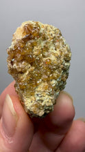 Load and play video in Gallery viewer, Hessonite Garnet Cluster on Matrix – Natural Collector Specimen from Pakistan | High-Grade Orange-Red Garnet Crystals
