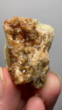 Load and play video in Gallery viewer, Hessonite Garnet Cluster on Matrix – Natural Collector Specimen from Pakistan | High-Grade Orange-Red Garnet Crystals
