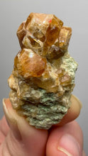 Load and play video in Gallery viewer, Hessonite Garnet Cluster on Matrix – Natural Collector Specimen from Pakistan | High-Grade Orange-Red Garnet Crystals
