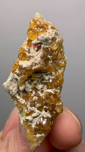 Load and play video in Gallery viewer, Hessonite Garnet Cluster on Matrix – Natural Collector Specimen from Pakistan | High-Grade Orange-Red Garnet Crystals
