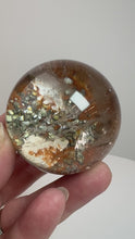 Load and play video in Gallery viewer, Garden Quartz Golden Rutile and/or Cubic Golden Pyrite Sphere • High Grade • RARE
