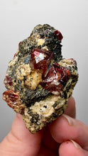 Load and play video in Gallery viewer, Naturally Faceted Zircon Crystal on Pegmatite–Biotite Matrix • Pakistan Mineral Specimen
