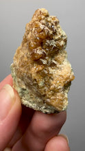 Load and play video in Gallery viewer, Hessonite Garnet Cluster on Matrix – Natural Collector Specimen from Pakistan | High-Grade Orange-Red Garnet Crystals
