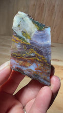 Load and play video in Gallery viewer, PREMIUM DISPLAY or LAPIDARY SLAB • Moroccan “Dream Landscape Jagate” (Purple, Teal, Red, Green, Red, Yellow &amp; Orange Moss Plume Agate + Jasper) Stone • Double Sided • High Atlas Mountains • Unpolished
